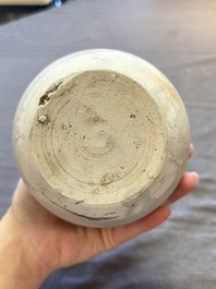 Three cream-glazed bottle vases and two jarlets from the Jepara shipwreck, Dehua or Anxi kilns, Song