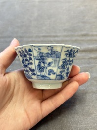 A set of 11 Chinese blue and white cups and saucers with riverscape design, Kangxi