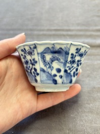 A set of 11 Chinese blue and white cups and saucers with riverscape design, Kangxi