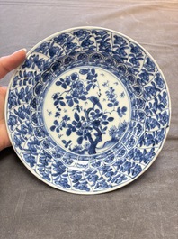 19 Chinese blue and white plates with antiquities, floral, and landscape design, Kangxi