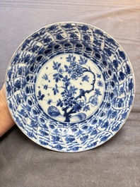 19 Chinese blue and white plates with antiquities, floral, and landscape design, Kangxi