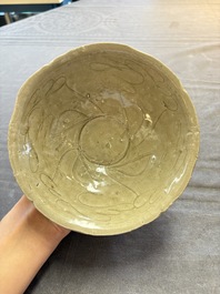 A group of 12 Chinese celadon-glazed bowls with incised floral design from the Jepara shipwreck, Fujian kilns, Song