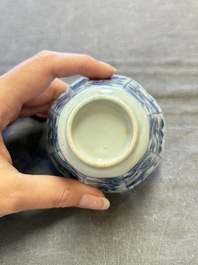 A set of 11 Chinese blue and white cups and saucers with riverscape design, Kangxi