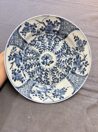 19 Chinese blue and white plates with antiquities, floral, and landscape design, Kangxi