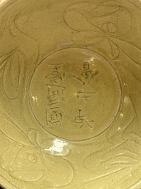 Three Chinese celadon-glazed plates and two bowls from the Jepara shipwreck,  Fujian or Zhejiang kilns, Song