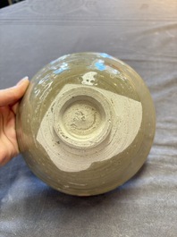 A group of 12 Chinese celadon-glazed bowls with incised floral design from the Jepara shipwreck, Fujian kilns, Song