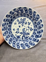 19 Chinese blue and white plates with antiquities, floral, and landscape design, Kangxi