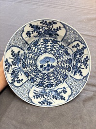 19 Chinese blue and white plates with antiquities, floral, and landscape design, Kangxi