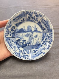 A set of 11 Chinese blue and white cups and saucers with riverscape design, Kangxi