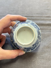 A set of 11 Chinese blue and white cups and saucers with riverscape design, Kangxi