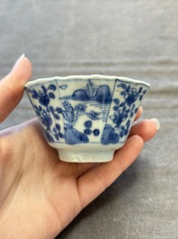 A set of 11 Chinese blue and white cups and saucers with riverscape design, Kangxi
