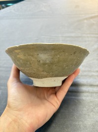 A group of 12 Chinese celadon-glazed bowls with incised floral design from the Jepara shipwreck, Fujian kilns, Song