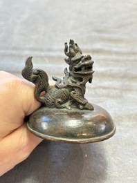 A Chinese archaistic miniature bronze 'qilin' tripod censer and cover, 'ding 鼎', Yuan/Ming