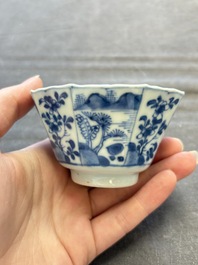 A set of 11 Chinese blue and white cups and saucers with riverscape design, Kangxi