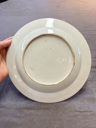 18 Chinese blue and white plates and saucers with floral design, 18th C.