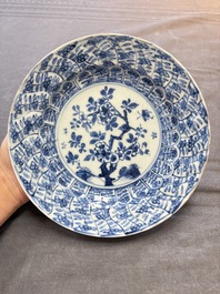 19 Chinese blue and white plates with antiquities, floral, and landscape design, Kangxi