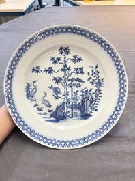 18 Chinese blue and white plates and saucers with floral design, 18th C.