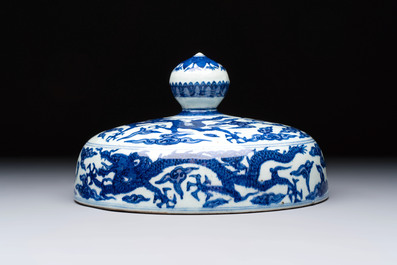 A Chinese blue and white 'dragon among clouds' cover, 20th C.