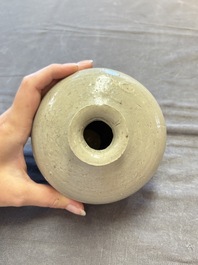 Three cream-glazed bottle vases and two jarlets from the Jepara shipwreck, Dehua or Anxi kilns, Song