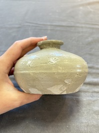 Three cream-glazed bottle vases and two jarlets from the Jepara shipwreck, Dehua or Anxi kilns, Song