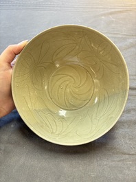 Three Chinese celadon-glazed plates and two bowls from the Jepara shipwreck,  Fujian or Zhejiang kilns, Song