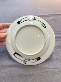 18 Chinese blue and white plates and saucers with floral design, 18th C.