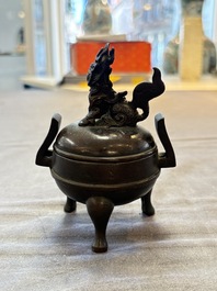 A Chinese archaistic miniature bronze 'qilin' tripod censer and cover, 'ding 鼎', Yuan/Ming