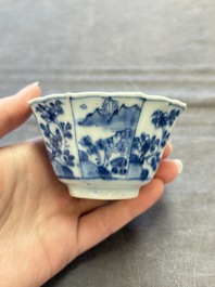 A set of 11 Chinese blue and white cups and saucers with riverscape design, Kangxi