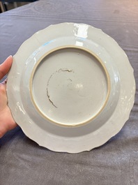 18 Chinese blue and white plates and saucers with floral design, 18th C.