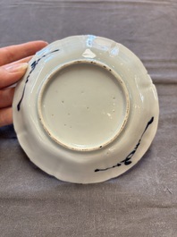 A set of 11 Chinese blue and white cups and saucers with riverscape design, Kangxi