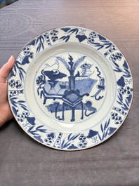 19 Chinese blue and white plates with antiquities, floral, and landscape design, Kangxi