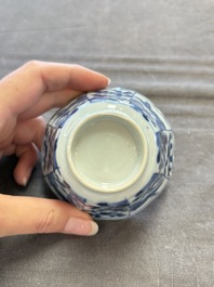 A set of 11 Chinese blue and white cups and saucers with riverscape design, Kangxi