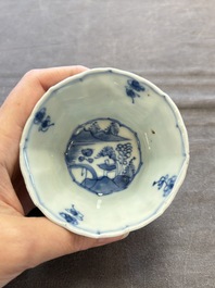 A set of 11 Chinese blue and white cups and saucers with riverscape design, Kangxi