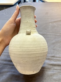 Three cream-glazed bottle vases and two jarlets from the Jepara shipwreck, Dehua or Anxi kilns, Song