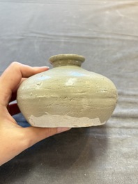 Three cream-glazed bottle vases and two jarlets from the Jepara shipwreck, Dehua or Anxi kilns, Song