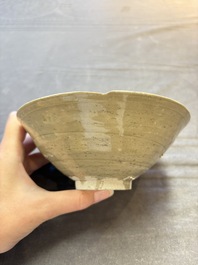 A group of 12 Chinese celadon-glazed bowls with incised floral design from the Jepara shipwreck, Fujian kilns, Song