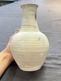 Three cream-glazed bottle vases and two jarlets from the Jepara shipwreck, Dehua or Anxi kilns, Song