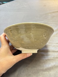 A group of 12 Chinese celadon-glazed bowls with incised floral design from the Jepara shipwreck, Fujian kilns, Song