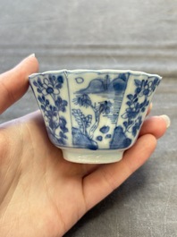 A set of 11 Chinese blue and white cups and saucers with riverscape design, Kangxi
