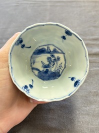 A set of 11 Chinese blue and white cups and saucers with riverscape design, Kangxi