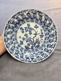 19 Chinese blue and white plates with antiquities, floral, and landscape design, Kangxi