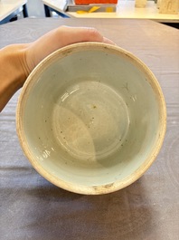 A Chinese Dehua blue and white vase, two containers and a 'prunus on cracked ice' vase, Kangxi mark, 18/19th C.