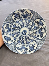 19 Chinese blue and white plates with antiquities, floral, and landscape design, Kangxi