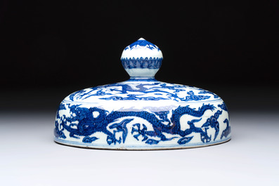 A Chinese blue and white 'dragon among clouds' cover, 20th C.