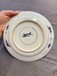 19 Chinese blue and white plates with antiquities, floral, and landscape design, Kangxi