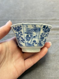 A set of 11 Chinese blue and white cups and saucers with riverscape design, Kangxi