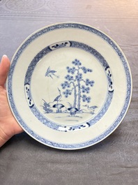 18 Chinese blue and white plates and saucers with floral design, 18th C.