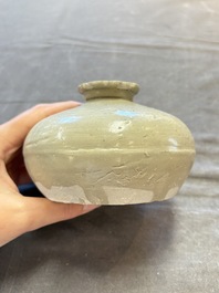 Three cream-glazed bottle vases and two jarlets from the Jepara shipwreck, Dehua or Anxi kilns, Song