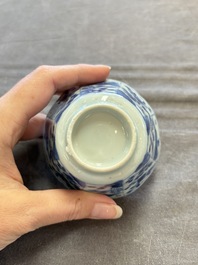 A set of 11 Chinese blue and white cups and saucers with riverscape design, Kangxi