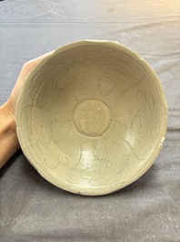 A group of 12 Chinese celadon-glazed bowls with incised floral design from the Jepara shipwreck, Fujian kilns, Song